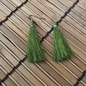 Green tassel earnings